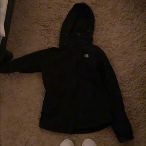 North face jacket with warm inner shell.